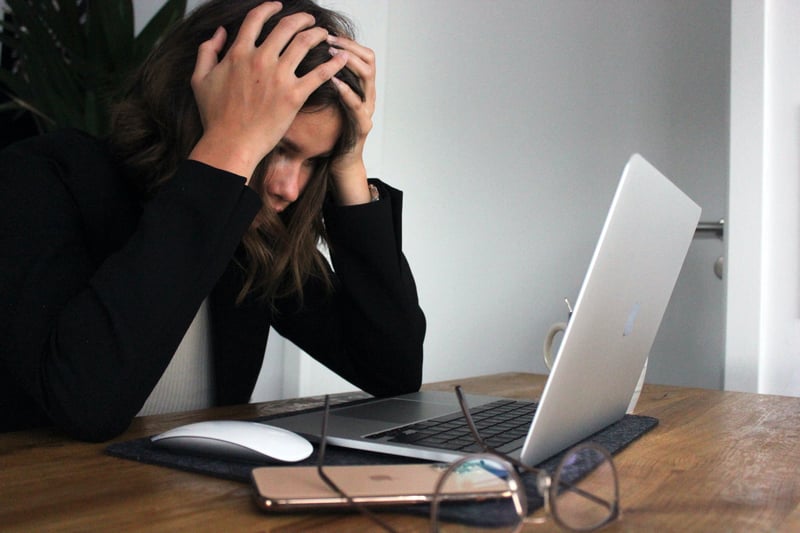 Frustrated Woman with Laptop